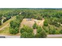 House on a large lot with wooded surroundings at 409 N Green Cir, Mcdonough, GA 30252