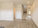 Open entry hall with stairs and views to other rooms at 211 Fern Dale Drive Dr # 120, Fairburn, GA 30213