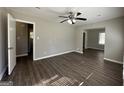 Bright living room with hardwood floors, neutral walls, and access to the backyard at 2164 Rockhaven Cir, Decatur, GA 30032