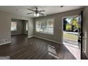 Spacious living room with hardwood floors, neutral walls, and plenty of natural light at 2164 Rockhaven Cir, Decatur, GA 30032