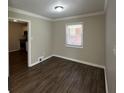 Charming dining room with hardwood floors and kitchen access at 739 Yale Sw Pl, Atlanta, GA 30315