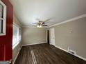 Bright living room with hardwood floors and ceiling fan at 739 Yale Sw Pl, Atlanta, GA 30315