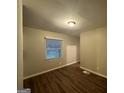 Simple bedroom with hardwood floors and window coverings at 362 Ard Nw Pl, Atlanta, GA 30331