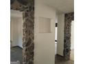 Unique hallway with stone pillars and built-in niche at 10219 N Dinah Cir, Covington, GA 30014