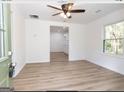 Bright living room with hardwood floors and ceiling fan at 3363 Delmar Nw Ln, Atlanta, GA 30331