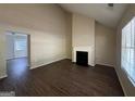 Living Room with fireplace and dark hardwood floors at 2755 Knollberry Ln, Decatur, GA 30034