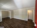 Living room with wood-look floors and neutral walls at 2425 Hanford Sw Dr, Atlanta, GA 30315