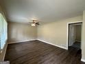 Spacious living room with hardwood floors and a ceiling fan at 2150 Macon Se Dr, Atlanta, GA 30315