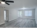 Spacious living area with wood-look floors and access to the exterior at 260 Pleasant Valley Rd, Mcdonough, GA 30253