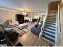 Spacious living room with fireplace and hardwood floors at 2628 Haligan Pointe, Riverdale, GA 30296