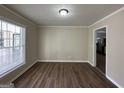 Simple dining room with hardwood floors and window at 1904 Caribaea Se Trl, Atlanta, GA 30316