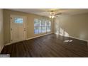 Living room with dark hardwood floors and lots of natural light at 3850 Bright Star Rd, Douglasville, GA 30135