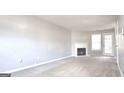 Living room with fireplace and neutral decor at 1986 Patterson Park Pl, Lawrenceville, GA 30044