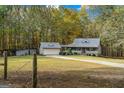 Ranch home with detached garage and large yard at 335 Gum Creek Rd, Roopville, GA 30170