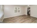 Bright living room featuring hardwood floors and neutral walls at 1262 Lorenzo Sw Dr, Atlanta, GA 30310
