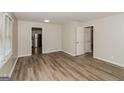 Simple bedroom with hardwood floors and neutral walls at 1262 Lorenzo Sw Dr, Atlanta, GA 30310