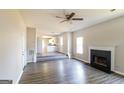 Living room with fireplace and hardwood floors at 2124 Hairston Creek Pkwy, Decatur, GA 30035