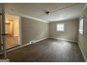Spacious bonus room with exposed brick wall and tile floors at 1919 Glenmar Dr, Decatur, GA 30032