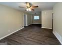 Bright living room with hardwood floors and ceiling fan at 1919 Glenmar Dr, Decatur, GA 30032