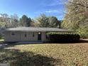 Updated ranch home with a front yard at 5950 Community Se Rd, Mableton, GA 30126