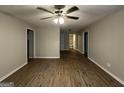 Spacious living area with hardwood floors and ceiling fan at 2190 Westover Dr, East Point, GA 30344