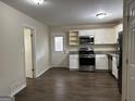 Renovated kitchen with stainless steel appliances and granite countertops at 2138 Springdale Rd, Atlanta, GA 30315