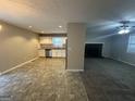 Open kitchen with granite countertops and stainless steel appliances at 3031 Tara Woods Dr, Douglasville, GA 30135