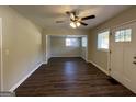 Bright living room featuring hardwood floors and a ceiling fan at 2233 Springdale Sw Cir, Atlanta, GA 30315