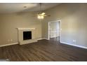 Bright living room featuring a fireplace and hardwood floors at 245 Remington Trl, Ellenwood, GA 30294