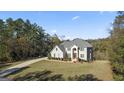 Spacious home on a large lot with a long driveway at 2202 Escalade Ct, Conyers, GA 30094