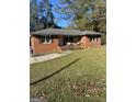 Brick ranch house with a large yard at 8965 Campbellton St, Douglasville, GA 30134