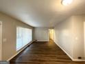Bright living room with hardwood floors and large windows at 2228 Sw Springdale Cir, Atlanta, GA 30315