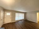 Spacious living area featuring hardwood floors and neutral walls at 2228 Sw Springdale Cir, Atlanta, GA 30315
