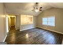 Living room with hardwood floors, high ceilings and open concept floorplan at 55 Stone Creek Dr, Covington, GA 30016