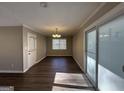 Bright dining area with hardwood floors and sliding glass doors at 2057 Sombrero Se Way, Atlanta, GA 30316