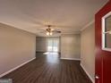 Bright living room with hardwood floors and sliding glass doors at 2057 Sombrero Se Way, Atlanta, GA 30316