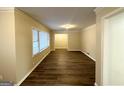 Spacious living area with hardwood floors and neutral color palette at 2798 Engle Nw Rd, Atlanta, GA 30318