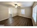 Bright living room with hardwood floors and access to other rooms at 3568 Glenview Cir, Atlanta, GA 30331