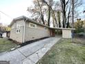 Ranch home with carport and mature trees at 2302 Montrose Dr, East Point, GA 30344