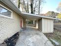Covered carport with access to backyard at 2302 Montrose Dr, East Point, GA 30344