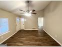 Spacious living room with hardwood floors at 4864 Brookstone Pkwy, Ellenwood, GA 30294