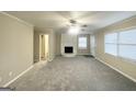 Spacious living room with fireplace and neutral colors at 2252 Wellington Hills Way, Snellville, GA 30039