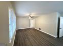 Bright living room with hardwood floors and neutral walls at 239 Silver Springs Sw Cir, Atlanta, GA 30310