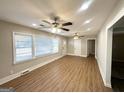 Spacious living area featuring hardwood floors and ample natural light at 2390 Candler Rd, Decatur, GA 30032