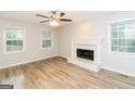 Living room with fireplace, hardwood floors, and neutral walls at 463 Swan Dr, Hiram, GA 30141