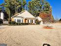 Nice curb appeal! Ranch style home with manicured lawn at 220 Woodgate Cir, Fayetteville, GA 30214