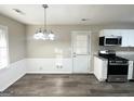 Modern kitchen with stainless steel appliances and granite countertops at 2442 Graywall St, East Point, GA 30344