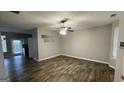Spacious living room featuring hardwood floors and neutral walls at 1768 Glen View Way, Hampton, GA 30228