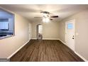 Bright living room with hardwood floors and access to other rooms at 3444 Orchard Cir, Decatur, GA 30032