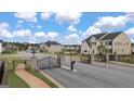 Gated community entrance at 671 Edgar St, Hampton, GA 30228